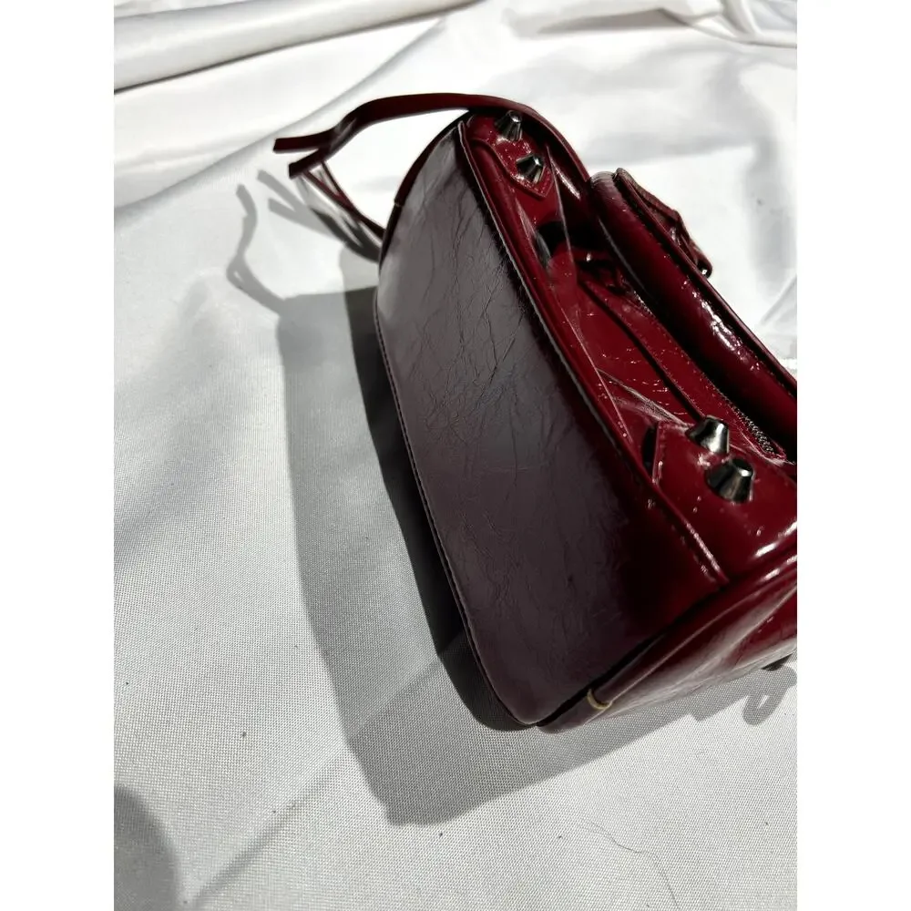 NWOT Deep Red Vegan Leather Handbag with Crossbody Strap and‎ Bag charms